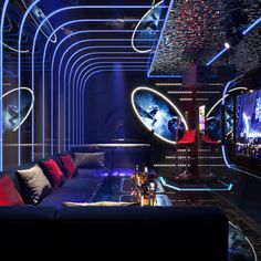 a living room filled with furniture and neon lights