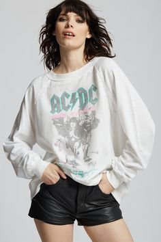 Celebrate the AC/DC live performance at Madrid's Plaza de Toros de Las Ventas that took place in July 1996 during the Ballbreaker World Tour, with the AC/DC No Bull Concert Sweatshirt. The sweatshirt features a perfectly oversized fit with soft-washed down fabric, ribbed cuffs, and collar. The design of this style is oversized. For a more standard fit, choose a size down. Details Style #301691 Color: White Vintage AC/DC No Bull 1996 Oversized Sweatshirt Keyword: ACDC 50% Cotton 50% Polyester Car Sorority Rush Dresses, Bachelorette Dress, Casual Bodysuit, Rush Dresses, Live Performance, Jumpsuit Shorts Rompers, Dressy Tops, Ac Dc, Oversized Sweatshirt