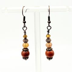 Artisan Handmade Red Jasper Beaded Earrings Antique Copper Drop Dangle Casual these were made my me measures 2" long antique copper components red jasper gemstone round bead other beads are glass and metal Simplistic and perfect for everyday wear Earwires are nickel free costume, fashion, gift, neutral, semi-precious Will combine shipping on multiple items Artisan Brown Beaded Nickel-free Earrings, Brown Beaded Czech Glass Earrings, Beaded Brown Czech Glass Earrings, Brown Adjustable Earrings With Natural Stones, Brown Czech Glass Bead Earrings, Brown Czech Glass Beaded Drop Earrings, Brown Copper Bead Earrings, Brown Copper Beaded Earrings, Brown Copper Earrings With Round Beads