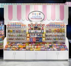 an ice cream stand with lots of different flavors