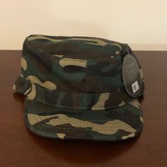 Camouflage Cadet Hat Color: Camo (Green, Tan, Black, Brown) Material: 100% Cotton Condition: New With Tags (Nwt) Military Style Khaki Bucket Hat, Military Style Khaki Brimmed Bucket Hat, Military Style Khaki Bucket Hat With Brim, Casual Camouflage Bucket Hat, Brown Military Visor Hat, Casual Camouflage Flat Cap, Military Camouflage Bucket Hat, Casual Camouflage Hat With Flat Brim, Military Style Camouflage Bucket Hat