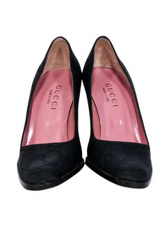 Step into timeless style with these sleek black canvas pumps from Gucci! Adorned with the iconic GG logo monogram, these chic shoes are perfect for adding a luxe touch to any outfit. With a stacked heel and pointed-toe, they're not only fashionable but also practical - perfect for elevating your workwear or completing any look. Size 5.5 Monogrammed canvas Block heel Light blemish Heel height 3.75" Chic Shoes, Gg Logo, Gucci Black, Gucci Shoes, Monogram Logo, Black Canvas, Stacked Heel, Timeless Style, Block Heels