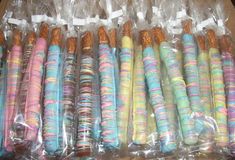 there are many candy sticks wrapped in plastic