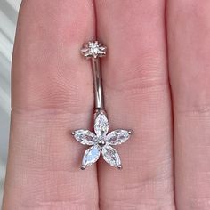 This cute flower belly button ring is made with surgical steel. A unique design, this marquise flower belly ring is a great minimalist/delicate option, very feminine and floral. Drop jaws with this body jewelry.This piece is internally threaded*Also available in silver and rose gold options. These pieces are 316L surgical steel but not 14k gold plated*Details & Size:♥ 316L Surgical Steel♥ Internally threaded♥ Size: 10mm bar, 14G Dragon Goddess, Bellybutton Ring, Belly Button Jewelry, Daith Earrings, Goddess Jewelry, Eyebrow Piercing, Belly Jewelry, Button Rings, Belly Button Ring