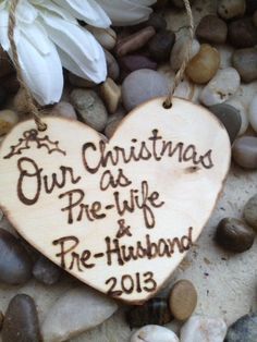 a wooden ornament that says our christmas as pre - life and the husband 2013