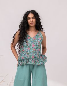 "STRING PEPLUM TOP | Ruffle Waist Blouse | Summer Sleeveless Top | Cropped Blouse Women | V Neck Linen Sleeveless Blouse >KNOW YOUR TOP< - standard fit - available in printed 100% cotton and Linen blend fabrics  - the model is 172 cm high (regular XS - S) and is wearing size S.  - print in the picture - P10 - (Please choose colors from drop down menu). >FIT< - The top is of standard fit >COLOR< - The top is available in 36 printed cotton fabrics and 40 Linen Cotton Blend Fabrics  - We found out the fabric to be rather hard to photograph to have an exact color for exposure - fabric wrinkles often catches unexpected light and show thousands of shades in different positions and certain lights. The actual colors also vary due to your computer resolution and monitor color restrictions. >SIZING< Green Sleeveless Summer Camisole, Green Sleeveless Summer Top, Sleeveless Summer Blouse With Ruffles, Sleeveless Ruffled Summer Blouse, Green Sleeveless Blouse Tank Top, Sleeveless Ruffled Vest Blouse For Summer, Ruffled Sleeveless Blouse Vest For Summer, Sleeveless Ruffled Vest For Summer, Sleeveless Casual Peplum Top For Summer