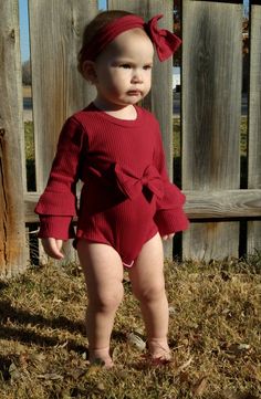 Adorable Winter/Christmas Romper in Maroon! This adorable gift set comes with matching a headband and barefoot sandals! (Color of flowers may vary but will always be cohesive and cute) Set: Romper Headband (HB) Barefoot Sandals (S) You can also get these personalized for no additional cost! Just leave name or saying, and desired font color in the personalization box when purchasing! ~Select a size and items from the drop down menu. *SHIPPING* All of the made-to-order items have an average turnar Weihnachten Outfit, Baby Picture Outfits, Toddler Halloween Outfits, Fairy Princess Birthday, Girl Christmas Outfit, Christmas Baby Romper, Burgundy Christmas, Jack The Pumpkin King, Baby Halloween Outfits