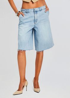 Epitomize laid-back style in SER.O.YA's Trelles Short. These baggy denim bermuda shorts are the perfect addition to your summer wardrobe. Crafted for comfort and style, these shorts boast a relaxed fit, raw-cut hem, and low-rise silhouette, offering both comfort and trendiness in one. Shown here in Coastline. 100% Cott Bachelorette Party Bride, Spring Knits, Business Chic, Baggy Shorts, Baggy Denim, Denim Sweater, Rehearsal Dress, Sequin Sweater, Jumpsuit Jacket