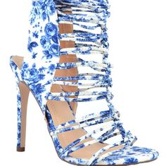 Color: White With Floral Pattern Fabric: Pu Approx. 5.5 Inch Heel Fastening: Zipper Perfect For Your Jeans And T-Shirt White High Heel Sandals With Floral Print, White Floral Print High Heel Sandals, Blue Heels With Floral Print And Round Toe, Blue Floral Print Heels With Round Toe, Summer Blue Floral Print Heels, Chic Blue Heels With Floral Print, Blue Floral Print Open Toe Heels, Chic Blue Floral Print Heels, Pattern Heels