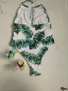 Bjux - Womens Leaf Print One Piece Swimsuit with Halter Neck, Tummy Control, and High Cut - Stylish Swimwear and Clothing Tropical Green Bodysuit For Vacation, Green Printed Beach Bodysuit, Green Printed Bodysuit For The Beach, Green Printed One-piece For Vacation, Summer Printed Green Bodysuit, Summer Green Printed Bodysuit, Printed Green Summer Bodysuit, Green Printed Summer One Piece, Summer Green Printed One-pieces