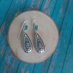 Unique Silver Engraved  Teardrop design with Turquoise Gemstones Length: 1 1/2"    Light weight Turquoise Teardrop Earrings For Jewelry Making, Turquoise Teardrop Earrings, Turquoise Teardrop Metal Jewelry, Pierced Turquoise Teardrop Jewelry, Turquoise Teardrop Drop Earrings, Handmade Turquoise Teardrop Earrings, Hypoallergenic Turquoise Teardrop Earrings In Sterling Silver, Turquoise Teardrop Pierced Jewelry, Unique Turquoise Teardrop Earrings