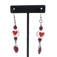 Red & White Ceramic Heart Beads, 16mm, Ceramic Heart Beads Details: White And Red 16mm X 9mm Bead Size Lentil With Heart Print Ceramic Adjustable Red Heart Earrings For Gift, White Heart Beads Earrings For Valentine's Day, White Heart Earrings With Beads For Valentine's Day, White Double Heart Earrings With Heart Beads, White Heart Bead Dangle Earrings, White Dangle Heart Bead Earrings, White Heart Beads Dangle Earrings, White Dangle Heart Earrings With Beads, Valentine's Day Heart Beads Dangle Jewelry