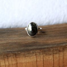 Hematite ring, Real Sterling Silver ring, cocktail ring, alternative engagement ring, avant garde, birthstone ring, Hematite jewellery Description: Be assured that the product you order is MADE JUST FOR YOU and is not a mass produced item. The gemstone is a OVAL shaped HEMATITE GEMSTONE SIZE-16*12 mm. You have an option to choose a gem for yourself from a set of the stones. Please ask. The rest of the ring is made from 925 STERLING SILVER i.e 92.5% pure silver. And it DOESN'T HAVE ANY LEAD OR NI Hematite Jewelry, Hematite Ring, Alternative Engagement Ring, Native American Style, Statement Ring Silver, Alternative Engagement Rings, Native American Fashion, Birthstone Ring, Cocktail Ring