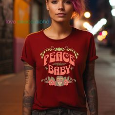 PEACE! lovepeacealoha presents this "Peace Baby" Retro 70's Hippie Chick Design printed on a Fashion favorite Bella + Canvas 3001 Cotton Short Sleeve T-Shirt in Unisex Sizes XS-5XL. Choose from Military Green, Asphalt, Black, Heather Brown, Cardinal, Heather Prism Natural and Heather Yellow Gold.  About the T-Shirt  This classic unisex jersey short sleeve tee fits like a well-loved favorite. Soft cotton and quality print make users fall in love with it over and over again. These t-shirts have-ribbed knit collars to bolster shaping. The shoulders are tapered for a better fit over time. Dual side seams hold the garment's shape for longer.  - Made with 100% Airlume combed and ring-spun cotton, a lightweight fabric (4.2 oz/yd) that is easy to layer, breathable. Perfect for active and leisure w Heather Brown, Hippie Chick, Retro 70s, New Shop, Cotton Shorts, Leisure Wear, Ribbed Knit, Cotton Tshirt, Short Sleeve Tee