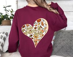 Who doesn't love autumn days and chilly winter nights? With its heartwarming design celebrating gratitude, this sweatshirt brings a touch of warmth. Ideal for anyone who loves a cozy, relaxed vibe that celebrates giving thanks. It's a thoughtful gift for that person you're always grateful to have in your life. The message is written on the back. ���🍒Details: Sizing: 🧡Check the size chart for the perfect fit! Size up as much as you want to get the looser fit. Printing: 💛The design is printed on a Pastor Wife, Always Grateful, Granola Girl Aesthetic, Pastors Wife, Love Autumn, Cinnamon Girl, Thankful Heart, Giving Thanks, Heart Sweatshirt