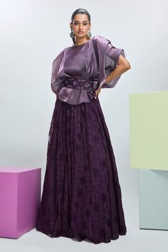 Deep plum glass organza cape with flared sleeves. Comes with a chantilly lace lehenga, a bustier and a belt. - Aza Fashions Evening Party Wear Sets In Organza, Organza Evening Sets For Party Wear, Organza Sets For Evening Party Wear, Organza Party Wear Sets For Evening, Organza Party Sets With Cape Sleeves, Elegant Party Lehenga With Long Skirt, Elegant Formal Organza Lehenga, Silk Sets With Cape Sleeves For Evening, Silk Evening Sets With Cape Sleeves