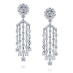 A stunning cascade of round and baguette-cut diamonds forming a dramatic chandelier drop earring that will turn heads. Length measures approximately 83mm from top to bottom, and approximately 24mm wide. These gorgeous chandelier earrings have approximately 38 carats total weight and are made in platinum. MATERIAL: Platinum DIAMONDS: Round Cuts, Baguette Cuts, One Trilliant-Cut in each earring QUALITY: F-G color, VS-SI clarity Length: 83mm (or 3.2inches) Closure: Omega back with post with rubber Luxury Dazzling Drop Chandelier Earrings, Luxury Diamond Accent Dangle Chandelier Earrings, Luxury Diamond Accented Dangle Chandelier Earrings, Dramatic Chandelier, Diamond Chandelier Earrings, Diamond Chandelier, Emerald Cut Diamond Ring, Platinum Earrings, Baguette Cut Diamond