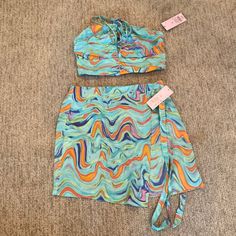 This Cute 2 Piece - Will Be Sold As A Set. Skirt Is A Size Small And Top Is A Medium. Cute For Beach Days! Casual Fitted Mini Skirt For Beach Season, Fitted Casual Mini Skirt For Beach Season, Trendy Multicolor Mini Skirt For Vacation, Casual Blue Two-piece Bottoms, Casual Two-piece Skirt For Summer, Multicolor Skort For Summer Vacation, Multicolor Skort For Summer Day Out, Multicolor Skort For Summer Beach, Multicolor Summer Skort For Day Out