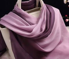 Made from premium mulberry silk, this scarf is perfect for an autumn day that is not so chilly. This silk scarf has a purple coloured theme with a gradient pattern. 180 by 65 CM (70 by 25 In ) 200 by 65 CM (78 by 25 In) 250 by 65 CM (98 by 25 In) 200 by 130 CM (78 by 50 In) Fabric: 100% Mulberry Silk Dispatch in 2 days. Regular Shipping via China Post Air Parcel (with limited tracking information and delivers in about 21 days worldwide.) Purple Chiffon Scarf Long, Ethereal Dramatic, Purple Silk Scarf, Ombre Scarf, Gradient Pattern, Purple Gradient, Soft Winter, Purple Silk, 21 Days