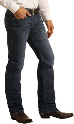 The Rock & Roll Denim Men's Slim Fit Stretch Straight Bootcut Jeans- Dark Wash is a classic western jean. The slim, straight leg gives a sleek western look that can transition from day to night. Men’s Bootcut Jeans, Fitted Denim Jeans, Takuache Outfits, Cargo Jeans Men, Takuache Outfits Guys, Mens Dark Jeans, Outfits Guys, Rock And Roll Jeans, Grooms Men