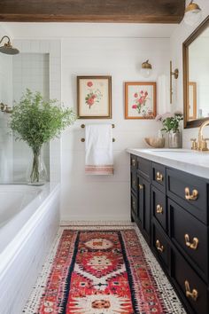 a bathroom with a rug, sink and bathtub