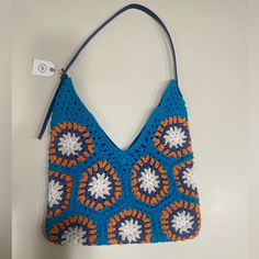 Super Cute Brand New With Tags Blue Rectangular Crochet Bag For Spring, Rectangular Blue Crochet Bag For Spring, Trendy Blue Crochet Bags, Handmade Blue Shoulder Bag For Spring, Handmade Blue Shoulder Bag For Beach Season, Spring Blue Rectangular Crochet Bag, Trendy Blue Crochet Bag For Spring, Blue Bohemian Shoulder Bag With Granny Square Details, Blue Bohemian Shoulder Bag With Granny Square