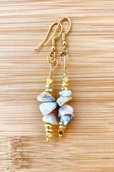 The TUSCAN SUN Crazy Lace Agate Chip Earrings were created with the lovely neutral Crazy Lace Agate chip gemstones with squared gold hematites to add a bit of uniqueness & more! These earrings are part of the 2022 POLYCHROMOS COLLECTION. Complete your look by adding the matching necklace, bracelet or loc jewel. Specifically created to match the 2022 Pieces Collection. Mix & match your jewels to enhance your outfit and exude your style! Length 1-1.5 in drop Gold Agate Gemstone Earrings, Gold Agate Earrings For Jewelry Making, Gold Agate Earrings With Natural Stones, Gold Earrings With Natural Agate Stones, Gold Agate Earrings, Chip Earrings, Blue Sodalite, Crazy Lace Agate, Matching Necklaces