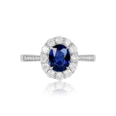 an oval shaped blue sapphire and diamond ring