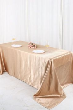 the table is covered with a gold cloth