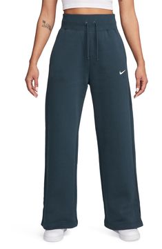 Get incredibly comfy in these wide-leg sweats cut from cozy brushed fleece and finished with split hems so you can show off your favorite footwear. 31" inseam; 23" leg opening; 13 1/2" front rise; 17 1/2" back rise (size Medium) 31 1/2" inseam; 24" leg opening; 14 1/2" front rise; 19" back rise (size 2X) Drawstring waist Side-seam pockets 80% cotton, 20% polyester Machine wash, tumble dry Imported Comfortable Nike Sweats, Nike Sweatpants For Fall, Wide Leg Nike Sweatpants, Comfortable Nike Sweatpants, Wide Leg Sweatpants For Sports In Fall, Wide Leg Sweatpants For Fall Sports, Nike Wide Leg Cotton Sweatpants, Cozy Nike Sweats, Sporty Wide-leg Sweatpants With Pockets