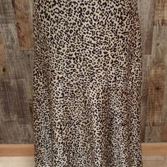 Nwt Chicos Womens Skirt Is Made From A Silky Slightly Stretchy Fabric With A Leopard Cheetah Print. The Long Skirt Has A Flared Hem And Is Fully Lined. Chico's Size Chicos Sz 0 (4-6), With The Following Measurements: Waist: 30" Hips: 40" Total Length: 32" Please Email With Any Questions. Fitted Long Skirt In Leopard Print, Leopard Print Long Skirt For Spring, Long Leopard Print Skirt For Spring, Leopard Print Flowy Long Skirt, Flowy Leopard Print Skirt For Spring, Flowy Long Leopard Print Skirt, Long Flowy Leopard Print Skirt, Leopard Print Lined Bottoms With Relaxed Fit, Leopard Print Mini Skirt For Fall