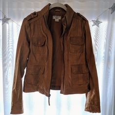 Excellent Used Condition Soft Camel Colored Leather, Zipper Sleeves, Four Functional Front Pockets Fall Leather Outerwear With Multiple Pockets, Fitted Biker Jacket With Multiple Pockets For Fall, Fall Leather Utility Jacket With Long Sleeves, Brown Leather Utility Jacket For Fall, Leather Utility Jacket With Long Sleeves For Fall, Brown Biker Jacket With Flap Pockets For Fall, Utility Leather Jacket For Fall Workwear, Brown Utility Outerwear With Zipper Closure, Brown Utility Leather Jacket For Fall