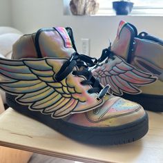 Adidas Js Wings 'Jeremy Scott' - G16054 - Multicolor Size: Men's Us 11.5 / Eu 44-45 Released 2010. Worn 10x. Regular Signs Of Wear. Does Not Come With Original Box Or Extra Laces. Jeremy Scott Adidas, Wing Shoes, Jeremy Scott, Mens Shoes Sneakers, Adidas Shoes, Adidas Men, Top Sneakers, Adidas Sneakers, Shoes Mens