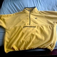 Size Xl Yellow Fleece Outerwear For Winter, Yellow Fleece Winter Outerwear, Casual Nike Fleece Jacket, Nike Cozy Winter Outerwear, Yellow Fleece Outerwear For Fall, Casual Nike Tops With Pockets, Nike Crew Neck Outerwear For Fall, Nike Fleece Outerwear With Pockets, Nike Oversized Long Sleeve Outerwear