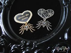 Gothic Victorian Brooch Set by @girlypop. Weave Me alone and Spiderweb pin available at Etsy.com/shop/girlypop. . . . . . . . . . . . . . . . . . . . . . . . . #spider #spiderwebjewelry #gothicenamelpin #gothic #gothicvictorian #goth #sogoth #black #blackblackblack #witchy #gothicframe #brooch #lapelpinbroochset #pinset #lapelpin #enamelpin #pingame #pingamestrong #vintageinspired Gothic Halloween Brooches For Gift, Gothic Halloween Brooch Jewelry, Halloween Gothic Brooch Jewelry, Black Halloween Pins As Gifts, Silver Brooch Jewelry For Halloween, Victorian Brooch, Spooky Black, Enamel Pin Collection, Halloween Pins