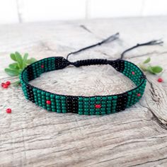 Hand woven loom beaded bracelet with Bangladesh flag. Patriotic  beads wristband with South Asia country symbols is a great gift for a women, girl or child for birthday, Christmas, Valentine's Day and other holidays. Small frienship memorable gift for best friend. The bracelet suitable for daily wear. Bracelet in stock and ready to ship. Other braselets with flags here: https://www.etsy.com/shop/BeadSeeShop?ref=seller-platform-mcnav&section_id=36120104 More bracelets here: https://www.etsy.com/s Gift Handwoven Braided Bracelets With Round Beads, Black Handwoven Friendship Bracelets As A Gift, Beaded Bracelet As A Gift, Handwoven Friendship Bracelets With Round Beads, Adjustable Weaving Beaded Bracelets As Gift, Adjustable Weaving Beaded Bracelets For Gifts, Handmade Green Bohemian Wristband, Green Bohemian Wristband As Gift, Green Bohemian Wristband For Gift