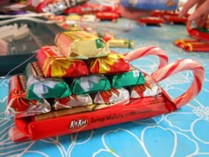 several candy bars are stacked on top of each other with ribbons tied around the ends