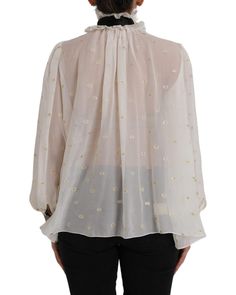 Off White Silk Blend Ascot Collar Blouse Top Blouse shirt style Black silk necktie scarf Button closure Made in Italy 77% silk and 23% polyester material Gold logo details Size on Tag: IT42|M Model Blouse, Ruffled Top, Blouse Material, Dolce E Gabbana, Silk Necktie, Polka Dot Blouse, Collar Blouse, Blouse Shirt, White Silk