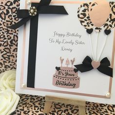 a birthday card with an animal print background and a leopard print design on the front