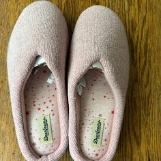 Light Pink Slippers, Never Worn! Size Large 9/10 Pink Cushioned Slippers With Synthetic Material, Pink Cushioned Synthetic Slippers, Pink Synthetic Slippers With Textured Footbed, Comfortable Pink Slippers With Cushioned Footbed, Casual Pink Slippers With Textured Footbed, Comfortable Pink Indoor Slippers, Pink Synthetic Slippers For Indoor Use, Pink Slippers With Textured Footbed And Round Toe, Pink Slip-on Indoor Slippers