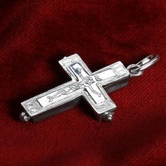 Greek Christian Orthodox Byzantine Reliquary Cross enable to open (hollow for relics).  Sterling Silver 925 Dimensions: Height: 3,1cm(1,22inches), Width: 2,3cm(0,90inches).  Conditions: Hand made! Brand new, unused, unopened! Shipping is made from Greece. Delivery is up to 10-20 working days worldwide.  #43 Engraved White Gold Spiritual Jewelry And Charms, Silver Crucifix For Wedding, Silver Byzantine Cross Jewelry, Byzantine Cross Sterling Silver Jewelry, Engraved White Gold Byzantine Jewelry, Byzantine Sterling Silver Cross Jewelry, Sterling Silver Byzantine Cross Jewelry, Byzantine Silver Jewelry For Weddings, Byzantine Style Sterling Silver Cross Jewelry