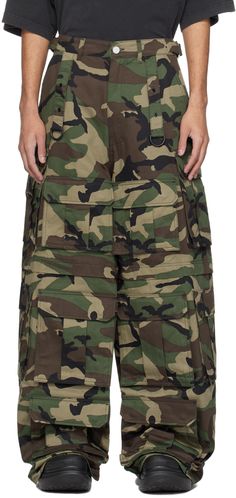 Wide-leg cotton twill cargo pants. Camouflage pattern printed throughout. · Paneled construction · Belt loops · Cinch straps at waistband · Four-pocket styling · Zip-fly · D-ring straps at front and back · Cargo pockets at front and outseams · Logo-engraved silver-tone hardware Supplier color: Camo Vetements Pants, Green Power Ranger, Camo Cargo Pants, Green Power, Power Ranger, Camo Pants, Silver Engraving, D Ring, Luxury Streetwear