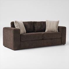 a brown couch with two pillows on it