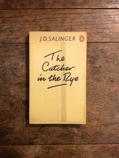 a yellow piece of paper with the words the catcher in the rye written on it