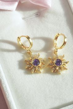 Welcome!  Sun Earrings-Sun Earrings-Purple Stone Earrings All jewelry comes in a pretty gift box, ready to be given as a gift or a gift to yourself. DETAIL: Craftsmanship: handmade * The product is BRASS * Our product is made of ZIRCON  * To prevent the color of your jewelry from fading; Care should be taken to avoid contact with external factors such as cream and alcohol. Keeping your jewelry in a pouch or a box after using it will prolong the life of your jewelry. * You can do your product mai Tangled Gift Ideas, Rapunzel Gift Ideas, Rapunzel Earrings, Tangled Earrings, Purple Stone Earrings, Disney Princess Jewelry, Princess Crown Ring, Tangled Jewelry