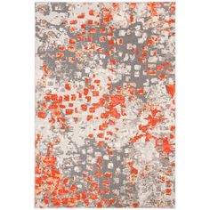 an orange and gray area rug with squares on the top, in various sizes and colors