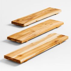 two pieces of wood sitting on top of each other