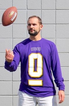 Curio Wellness Football (Purple) / Long Sleeve - Route One Apparel Purple Long Sleeve, Sport Style, Medium Purple, Logo Tees, Sport Fashion, Black Tee, Game Day, Long Sleeve Shirt, Black Shirt