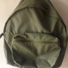 Eastpak Nwt Olive Green Small Bagpack Classic Outdoor Bag With Zipper Pocket, Classic Green Backpack For Everyday, Classic Outdoor Bags With Pockets, Everyday Khaki Bags For Back To School, Back To School Khaki Bags For Daily Use, Classic Green Standard Backpack, Khaki Standard Backpack For Back To School, Classic School Bags With Pockets, Practical Green Bag For Back To School