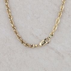 This men's 10k yellow gold chain is a diamond cut rope style that measures 20" in length and 3.5mm in width. It weighs 18.3 grams and is a solid gold rope. The chain is a Michael Anthony chain with the trademark stamp on the lobster clasp. Condition: Pre-Owned *All items are thoroughly inspected for quality assurance purposes 14k Gold Rope Chain Necklace As Gift, Classic Rope Chain Necklace In 14k Gold, Classic 14k Gold Rope Chain Necklace, 14k Gold Oval Link Rope Chain Necklace, Formal 14k Gold Figaro Rope Chain Necklace, 14k Gold Curb Chain Rope Necklace Gift, Gold Diamond Cut Rope Chain Necklace Gift, 14k Gold Rope Chain Link Jewelry, 14k Gold Rope Chain Necklace With Curb Chain